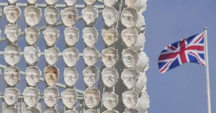 Faces of transgender people adorn an artwork in London&#8217;s Trafalgar Square