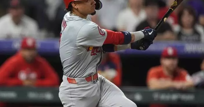 Winn homers, drives in 4 runs as Cardinals top Rockies 7-3