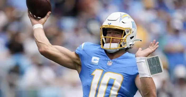 Chargers QB Justin Herbert doesn't practice because of right ankle injury