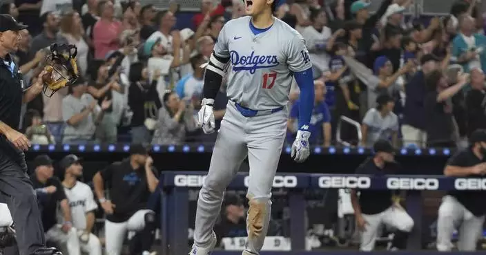 Ohtani has 3 homers, 10 RBIs and becomes first 50-50 player as Dodgers rout Marlins, clinch playoffs