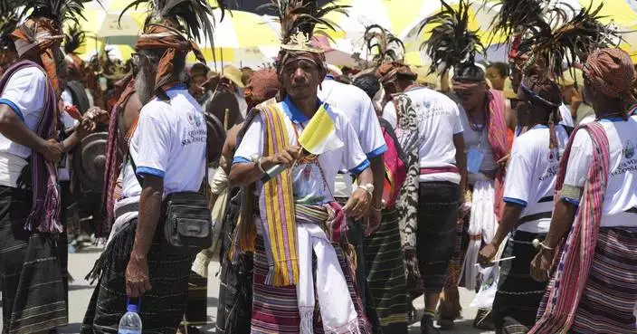 Pope arrives in deeply Catholic East Timor to encourage its recovery from bloody independence