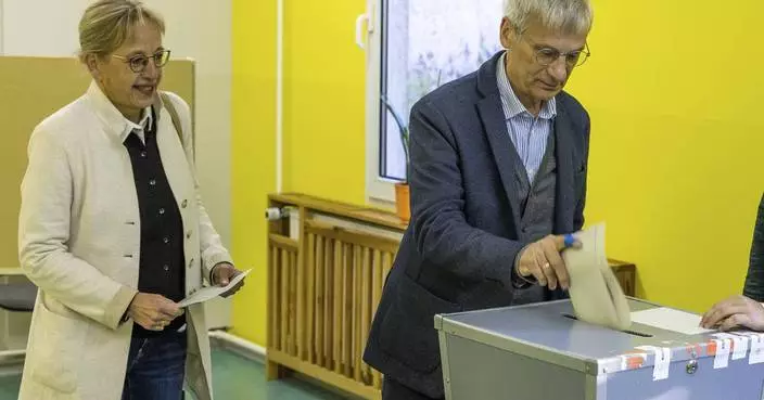 Exit poll gives Scholz&#8217;s Social Democrats a slight lead over far right in German state vote