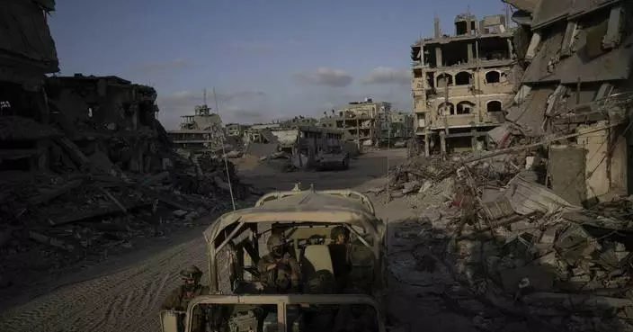 AP PHOTOS: A visit to Gaza reveals rubble, tunnels and new asphalt along Egypt&#8217;s border