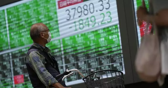 Japan&#8217;s stocks slump after prime minister election; Shanghai benchmark soars more than 5%