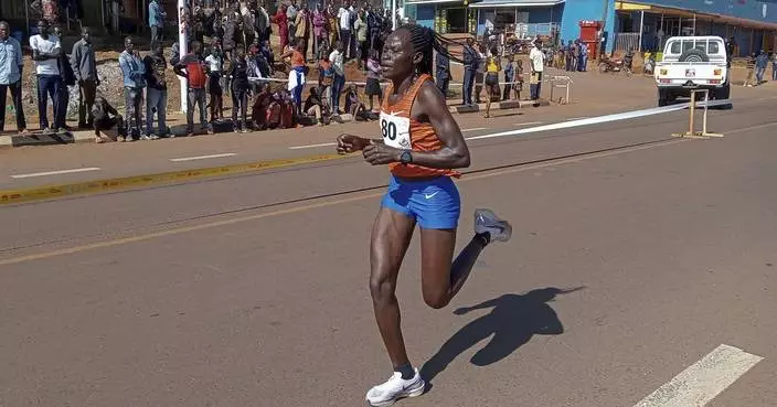 Mourners pay respects to  Ugandan athlete who died after her partner set her on fire