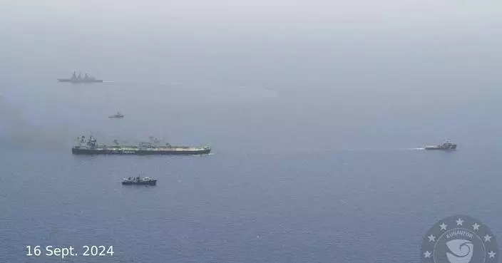 Burning oil tanker is safely towed away from Yemen after rebel attacks