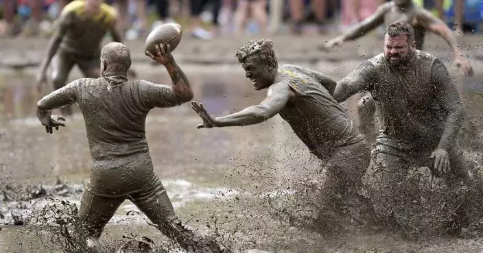 Joy in Mud Bowl: Football tournament celebrates 50 years of messy fun