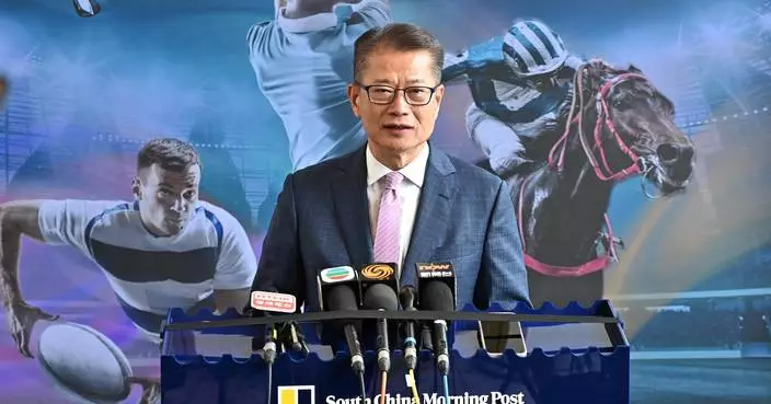 Financial Secretary Discusses Kai Tak Sports Hub and Support for Struggling SMEs in Hong Kong.