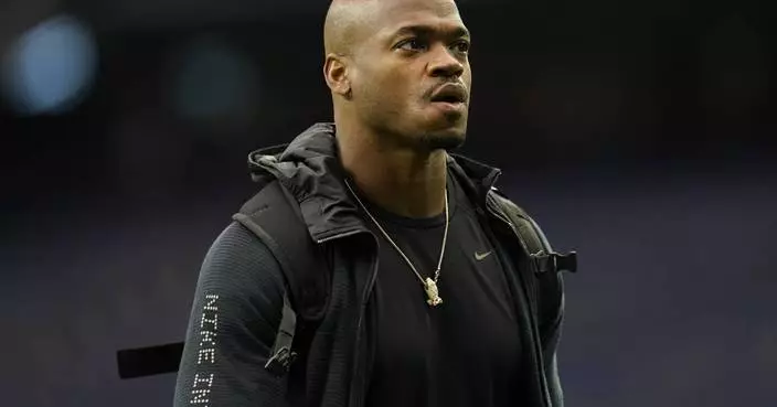 Judge orders former NFL star Adrian Peterson to turn over assets to pay $12M debt