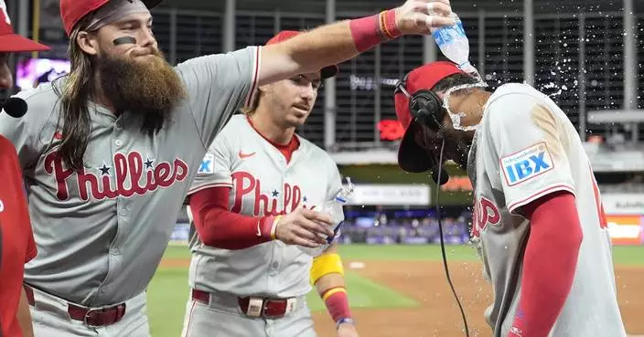 Trea Turner, Kyle Schwarber homer to help Phillies overpower Marlins 16-2