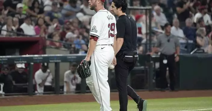 Diamondbacks&#8217; Merrill Kelly leaves start against Rangers in the fifth inning with hamstring cramp