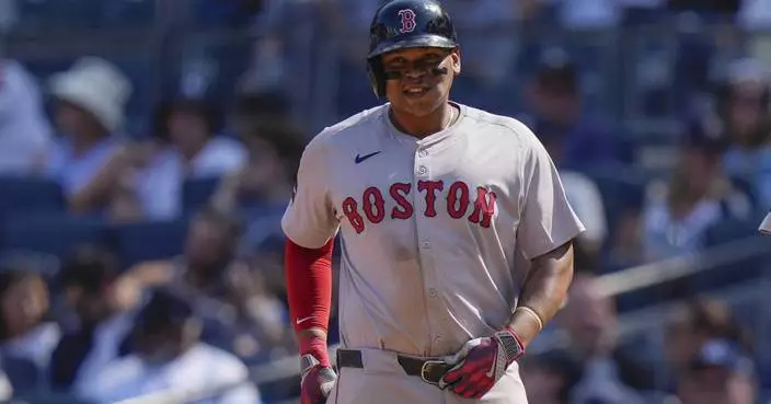 Devers' intentional walk from Cole with no runners one on sparks Red Sox over Yankees 7-1