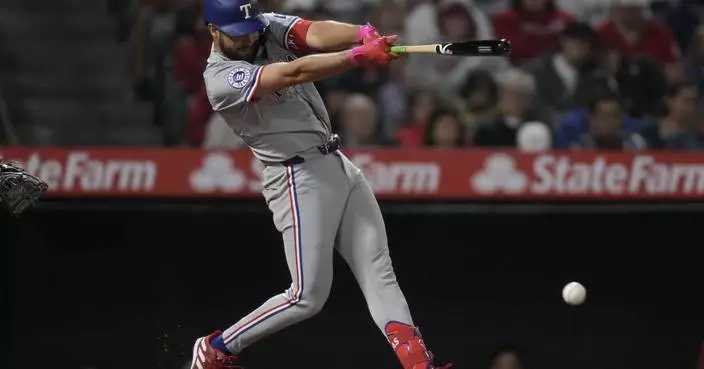 Rangers score four runs in ninth to beat Angels 9-8