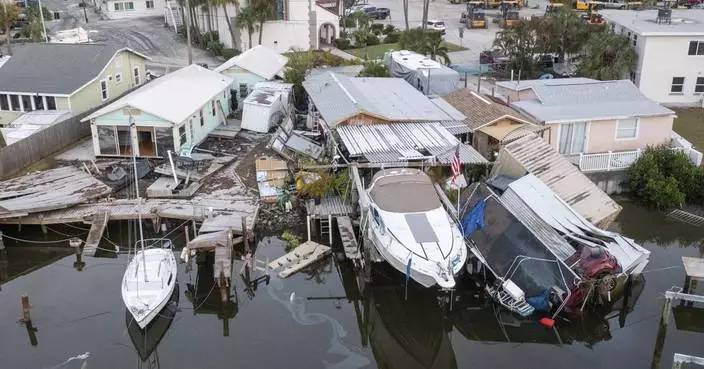 Supplies rushed to communities isolated by Helene as death toll rises to nearly 100