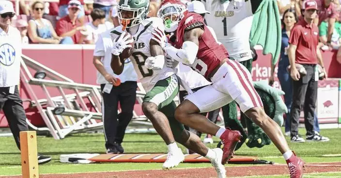 Jackson, Green lead potent ground game and Arkansas tops UAB 37-27 after trailing by two touchdowns