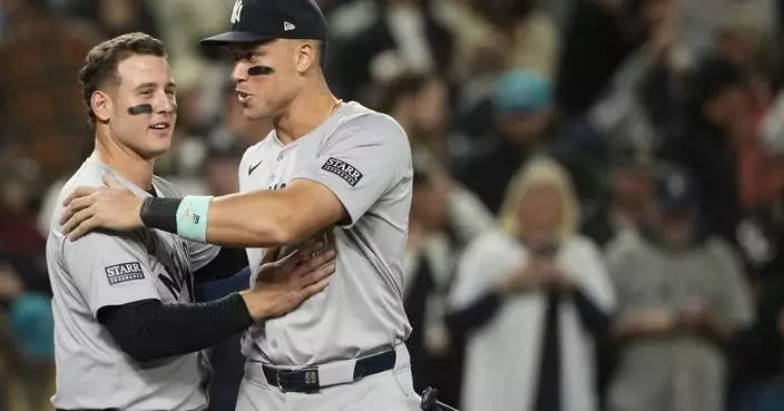 Rizzo drives in 2 runs as Yankees earn playoff berth with 2-1 win over Mariners in 10 innings