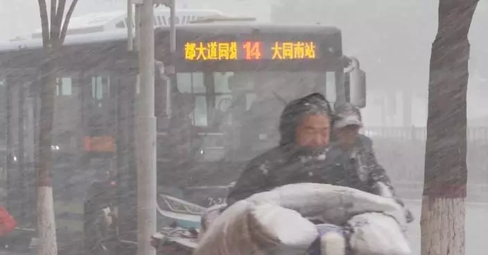 Cold front hits Shanxi, bringing sleet, temperature drop