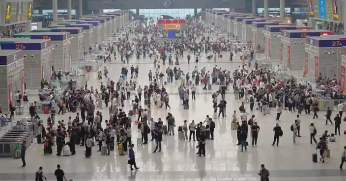 China&#8217;s railway system handles 105 million passenger trips during National Day holiday