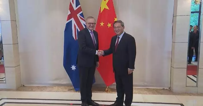 Chinese premier says China ready to share more development opportunities with Australia