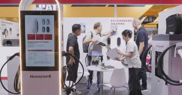 Palm-sized EV charger, customized garbage truck shine at Canton Fair