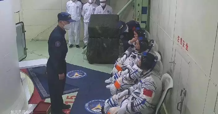 Shenzhou-19 astronauts board spaceship ahead of launch