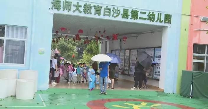 Classes suspended, trapped workers saved in Hainan amid downpours brought by Typhoon Trami