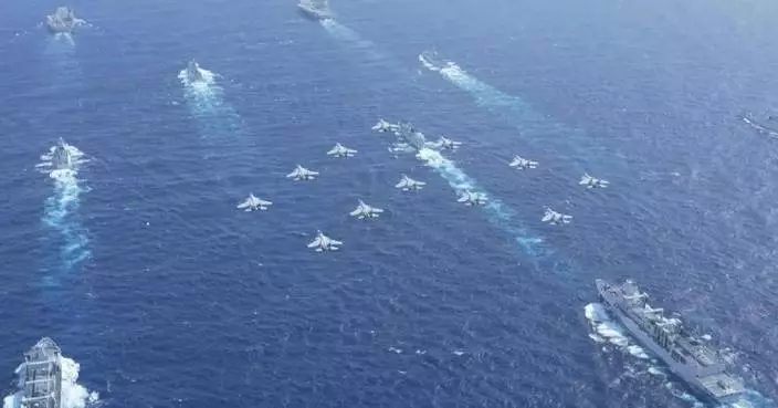 Chinese navy conducts dual aircraft carrier formation exercise for first time