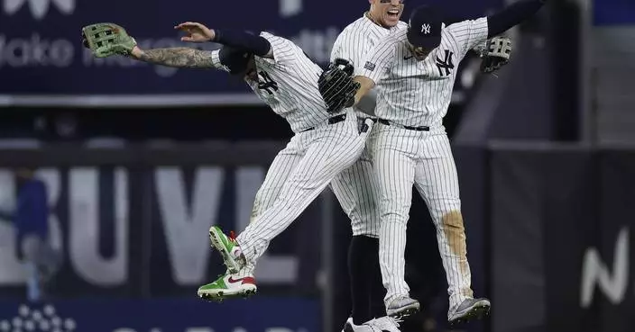 Mets and Yankees win playoff games on same day for first time in 24 years