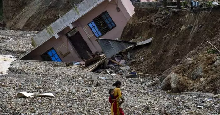 AP PHOTOS: Nepalese grapple with loss after floods kill over 200 people