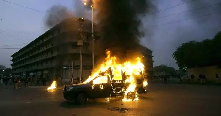 Pakistani police fire tear gas and charge protesters in Karachi