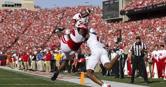 Cornhuskers beat the heat and then Rutgers 14-7 to move within a win of bowl eligibility