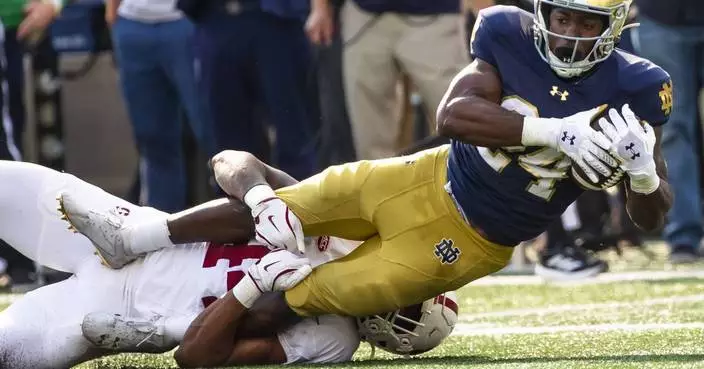 Leonard throws 3 TD passes and runs for another score as No. 11 Notre Dame beats Stanford 49-7