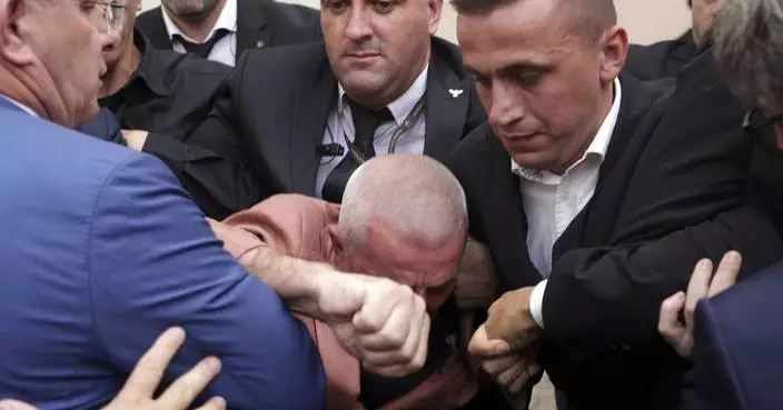 Albanian opposition MPs try to disrupt Parliament to protest a colleague's imprisonment