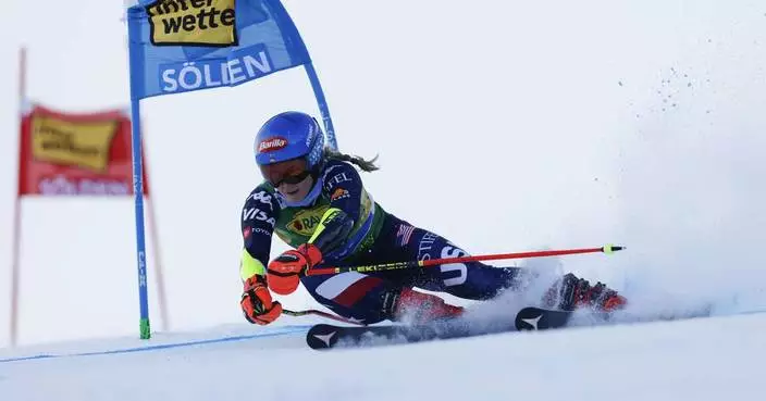 Shiffrin leads skiing World Cup opener after 1st run with overall champion Gut-Behrami not starting