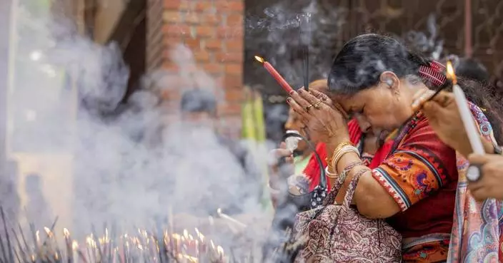 Hindus in Bangladesh celebrate their largest festival under tight security following attacks