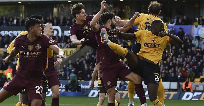 Stones scores injury-time winner as Man City beats struggling Wolves 2-1 in Premier League