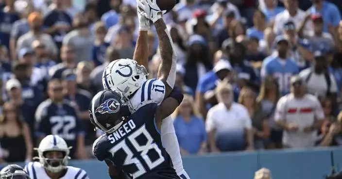 Joe Flacco throws two TD passes as the battered Colts beat the Titans 20-17