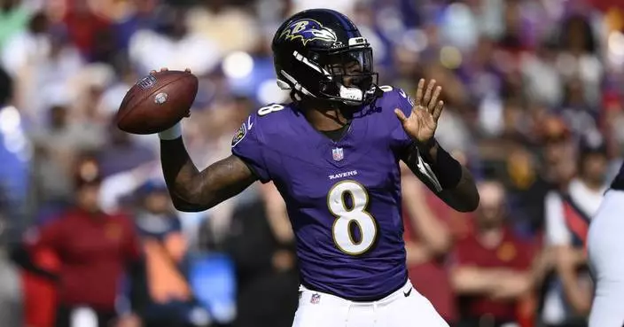 Derrick Henry runs for two TDs and Lamar Jackson throws for 323 as Ravens beat Commanders