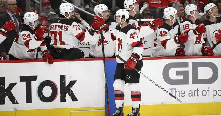 Cotter scores 2 goals to lift Devils over Capitals 5-3