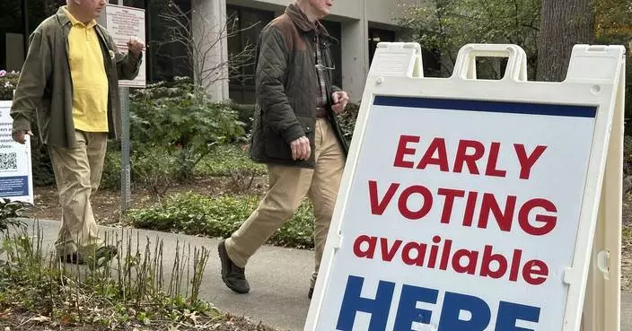 Georgians flock to cast ballots as early in-person voting begins