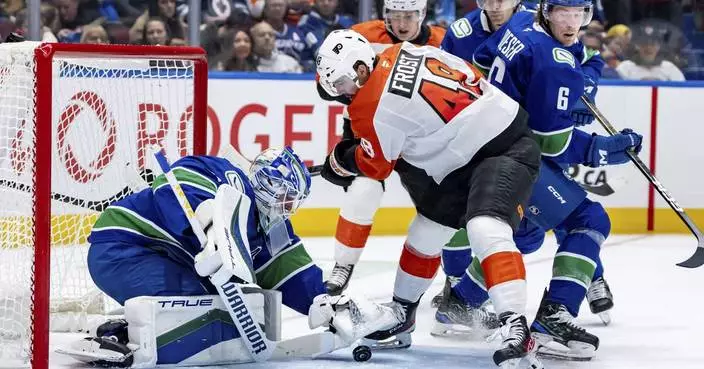 Frost scores in shootout to lift the Flyers to a 3-2 win over the Canucks