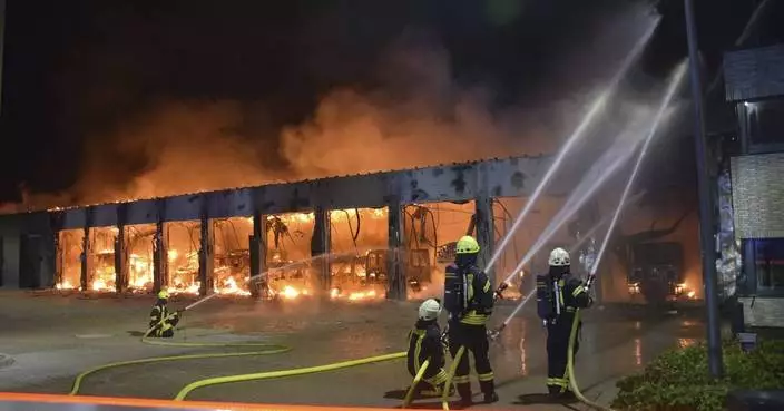 A blaze burns down a brand-new fire station in Germany that lacked fire alarms