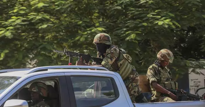 Police in Haiti battle a gang coalition trying to seize control of the entire capital