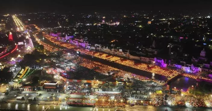 Indians celebrate Diwali by lighting a record number of clay lamps