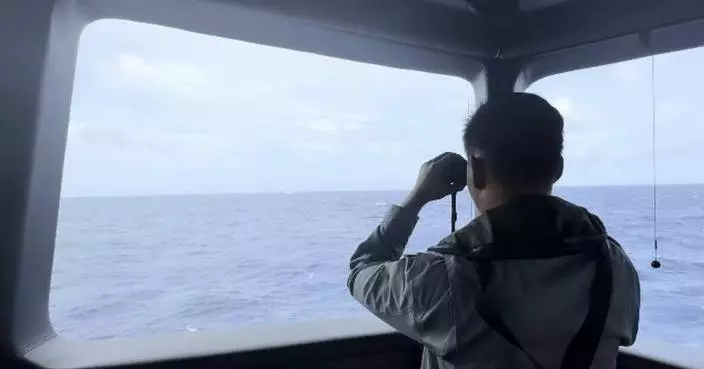 Indonesia says its coast guard drove away Chinese ship that interrupted survey in disputed sea