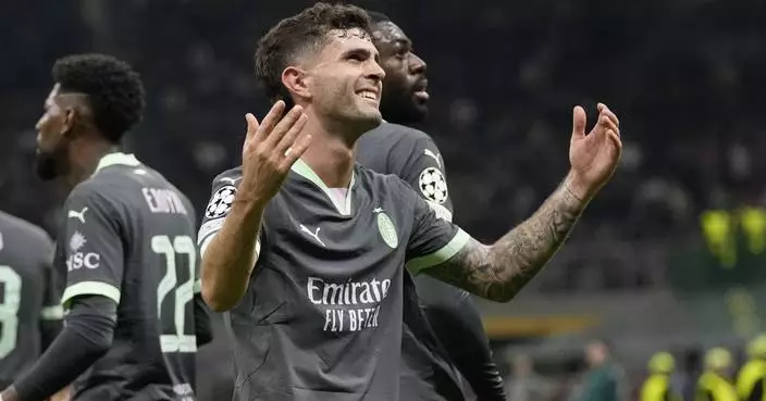 Pulisic scores direct from corner kick to set AC Milan on way to Champions League win