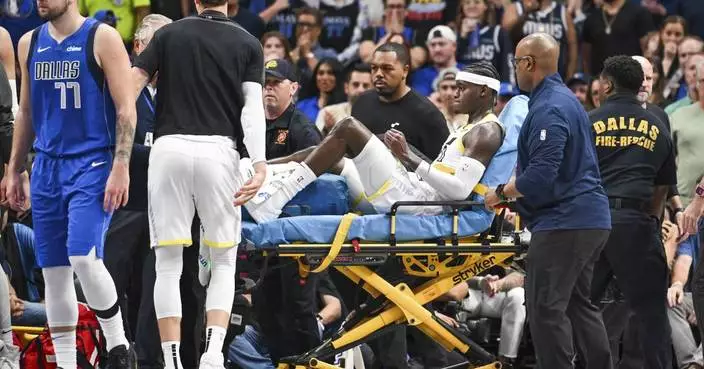 Utah Jazz&#8217;s Taylor Hendricks stretchered off the floor after breaking his leg