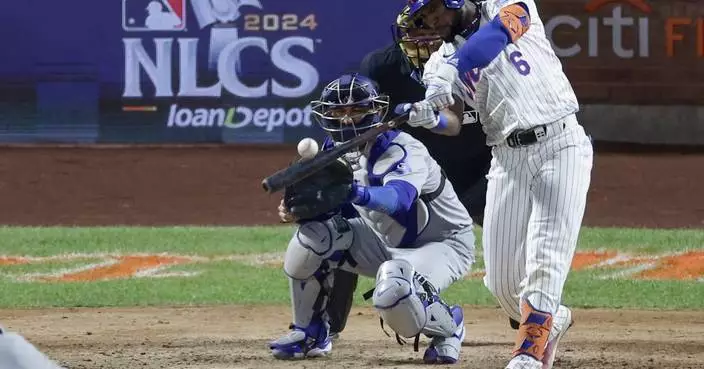 Starling Marte wears necklace from fan, gets his 4th hit in Mets&#8217; NLCS win over Dodgers