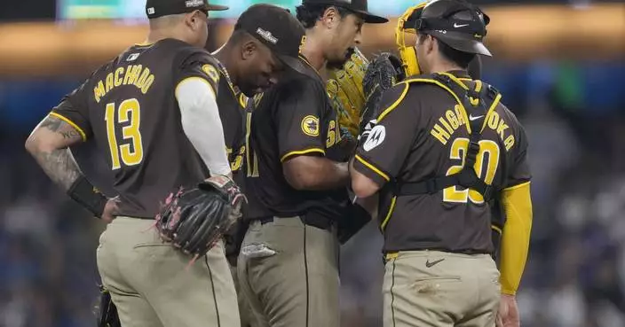 Tossed balls from stands, apparently aimed at Profar, interrupts Padres' win in NLDS Game 2