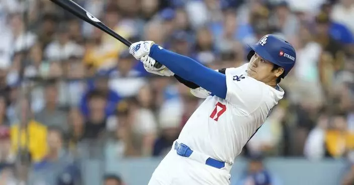 Ohtani hits tying 3-run homer in 2nd at-bat of playoff debut for the Los Angeles Dodgers in NLDS